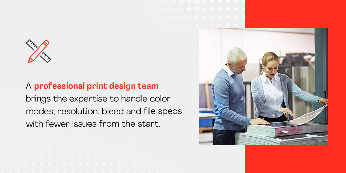 A professional print design team reviewing prints